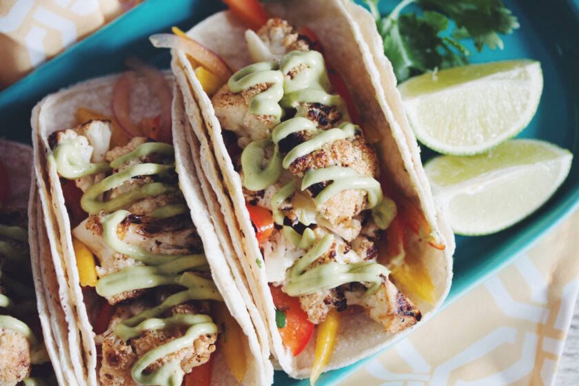 grilled cauliflower tacos with mango slaw & avocado crema_hot for food