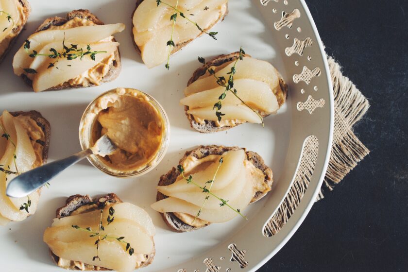 vegan smoked cashew cheese toast with poached pear & fried thyme hot for food
