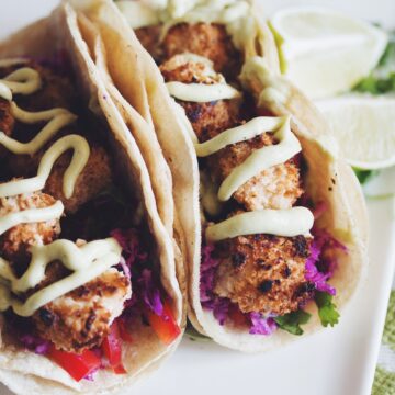 a plate of two crispy coconut tofu tacos