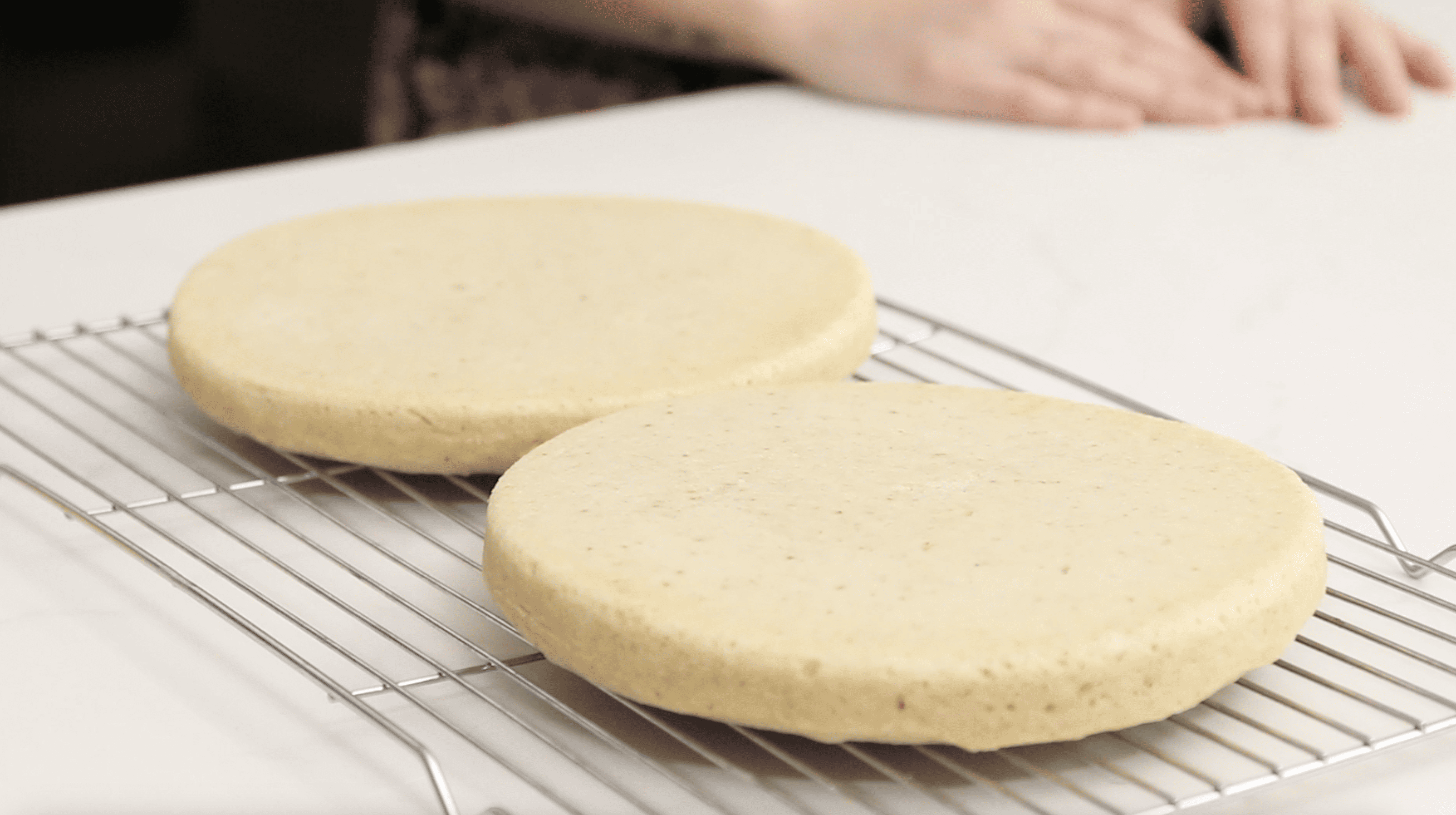 vanilla cake on wire rack