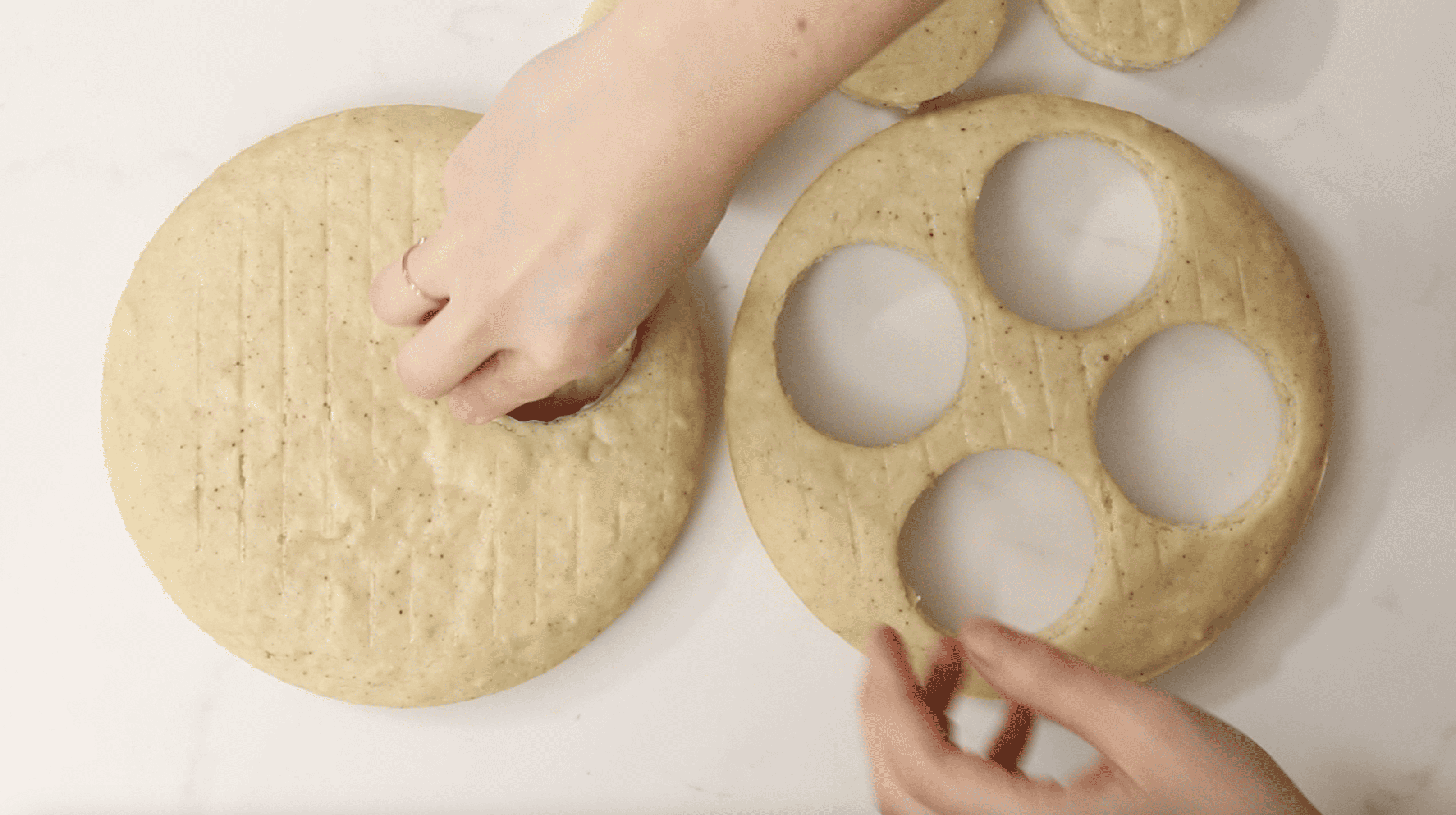 cake being cut with a cookie cutter