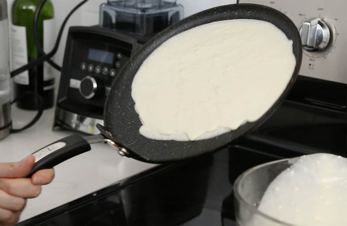 crepe pan with batter on it