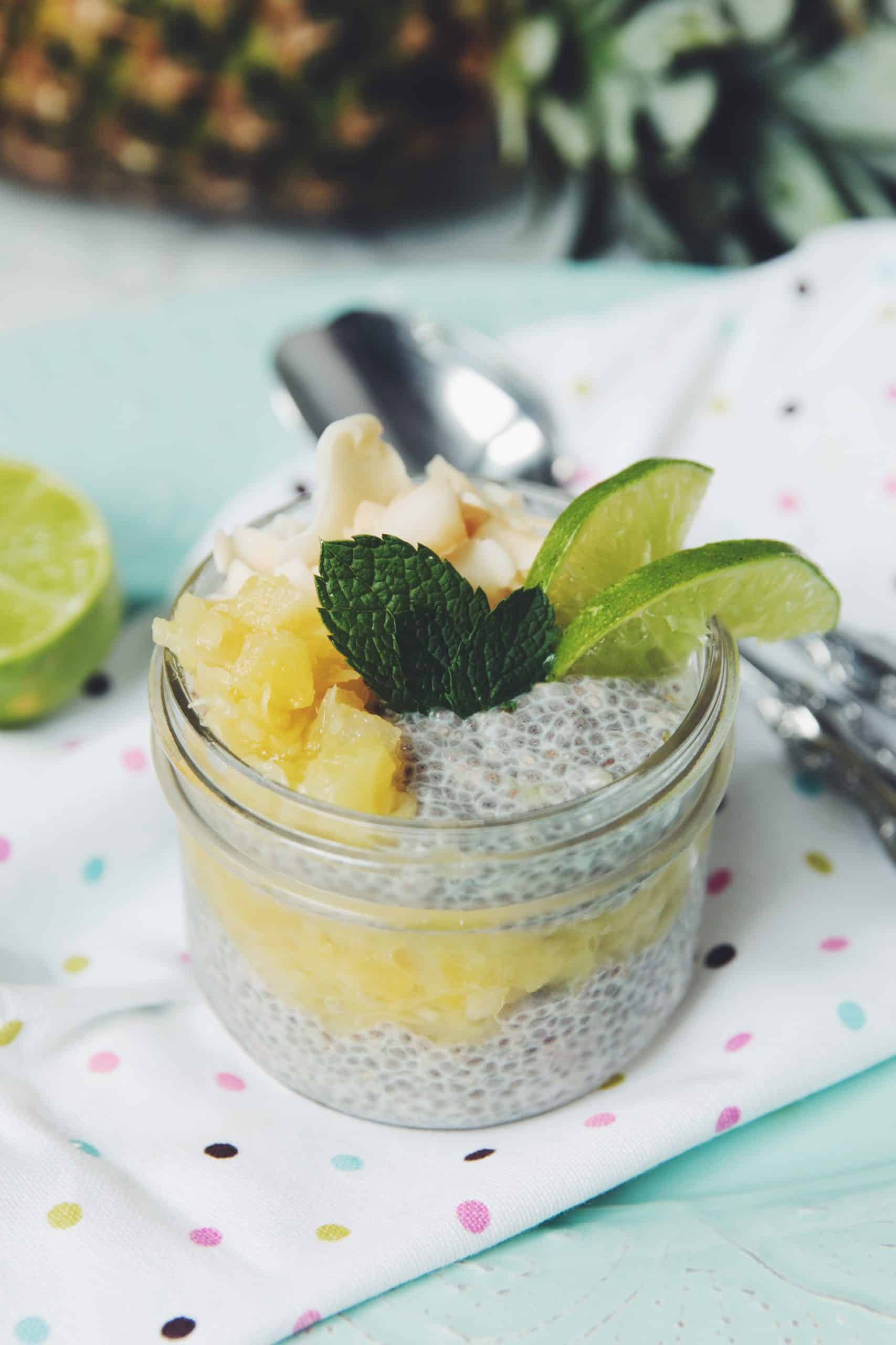 diners view of a jar of chia pudding flavored with pineapple